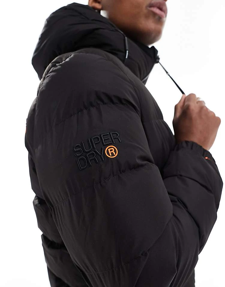 Superdry Hooded Sports Puffer Jacket In Black For Men 6 Superdry Hooded Sports Puffer Jacket In Black For Men - Image 4