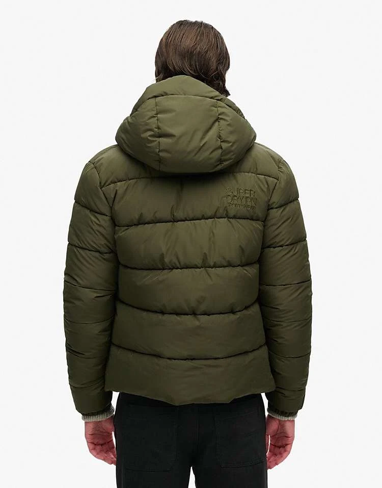 Superdry Hooded Sports Puffer Jacket In Dark Moss Green For Men 6 Superdry Hooded Sports Puffer Jacket In Dark Moss Green For Men - Image 4